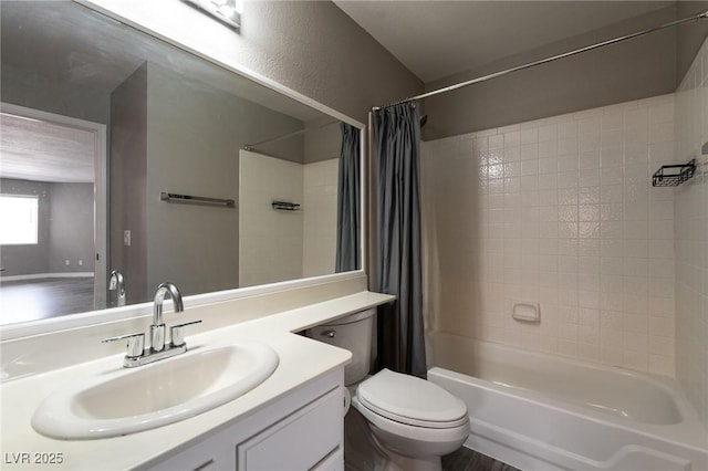6873 Tamarus St Unit 201, Las Vegas, NV 89119 - full bathroom featuring shower / bath combo, toilet, and vanity