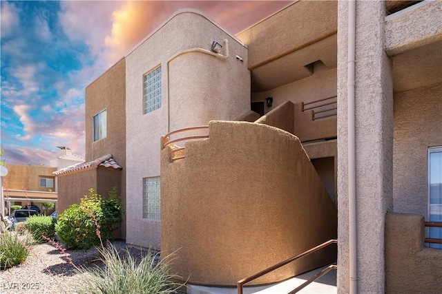 6873 Tamarus St Unit 201, Las Vegas, NV 89119 - view of home's exterior featuring stucco siding
