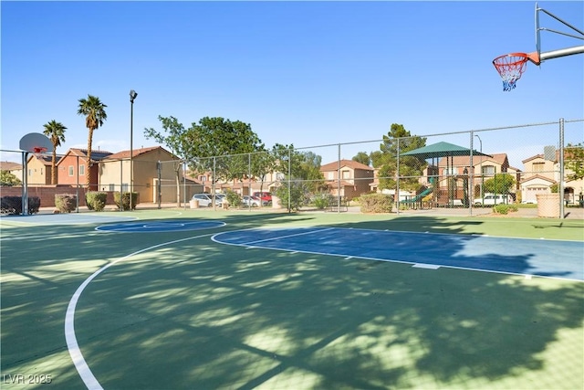 5456 Raccoon Valley Ln, Las Vegas, NV 89122 - view of sport court with community basketball court and a residential view