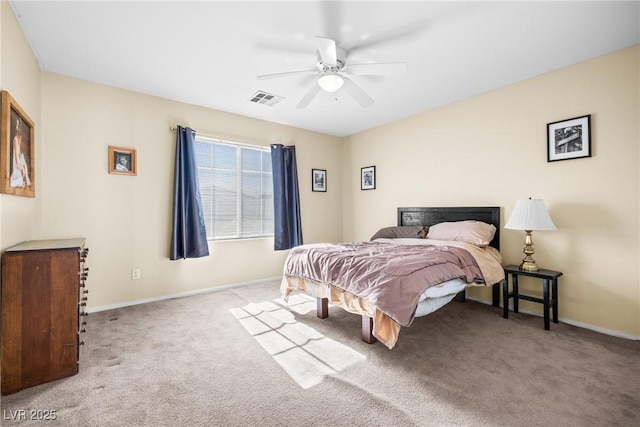 5456 Raccoon Valley Ln, Las Vegas, NV 89122 - bedroom with carpet floors, baseboards, and a ceiling fan