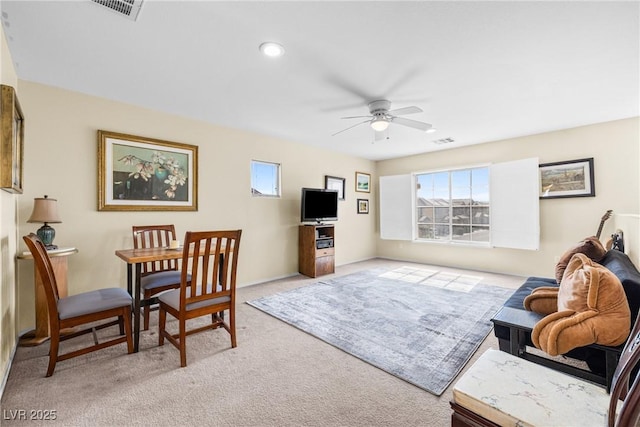 5456 Raccoon Valley Ln, Las Vegas, NV 89122 - living room with ceiling fan and carpet floors