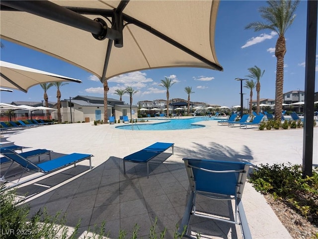 2629 Mocha Pearl Ct, North Las Vegas, NV 89086 - community pool featuring a patio area and a residential view