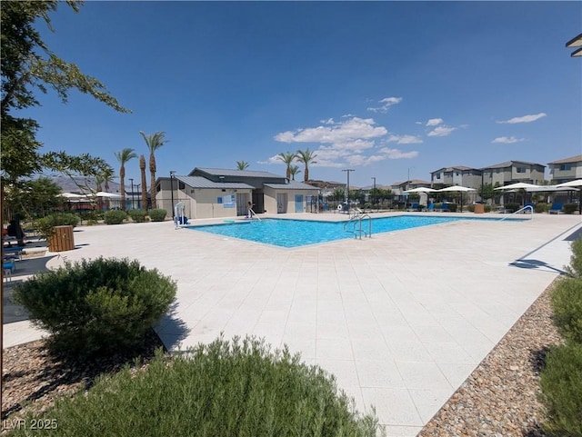 2629 Mocha Pearl Ct, North Las Vegas, NV 89086 - community pool featuring a patio area and a residential view