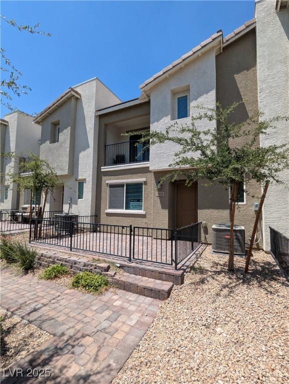 2629 Mocha Pearl Ct, North Las Vegas, NV 89086 - view of front of home featuring a balcony and stucco siding