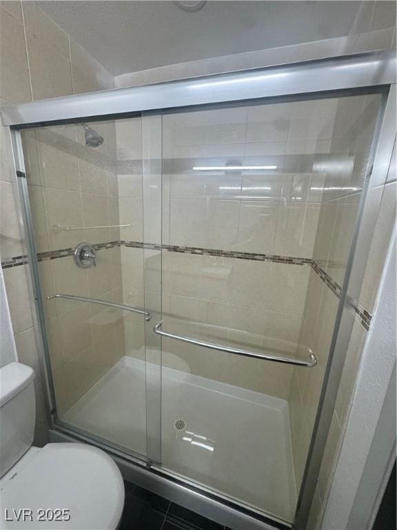 3920 Aspencrest Dr, Las Vegas, NV 89108 - bathroom with toilet and a shower stall