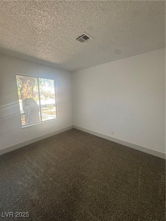 3920 Aspencrest Dr, Las Vegas, NV 89108 - carpeted empty room with a textured ceiling and baseboards