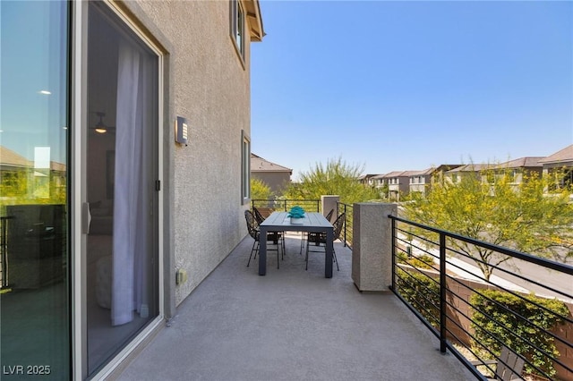 7983 Texas Hills St, Las Vegas, NV 89113 - balcony featuring outdoor dining area and a residential view