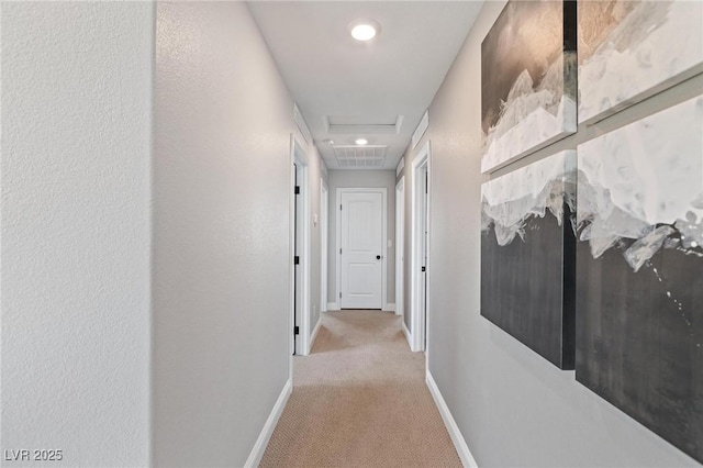 7983 Texas Hills St, Las Vegas, NV 89113 - corridor featuring baseboards, light colored carpet, and recessed lighting