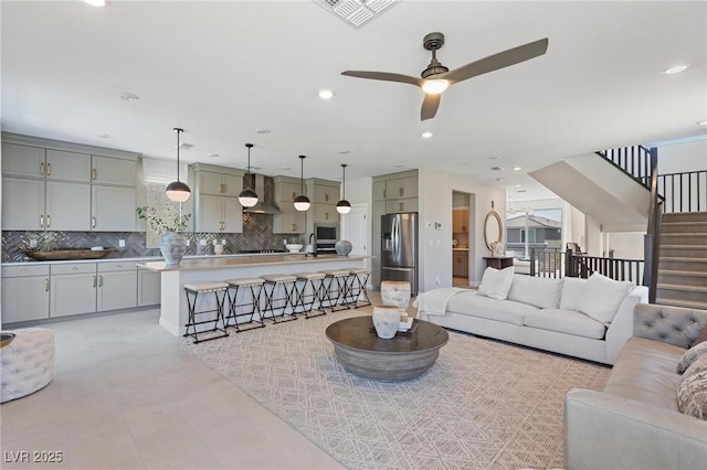 7983 Texas Hills St, Las Vegas, NV 89113 - living room with stairs, ceiling fan, and recessed lighting