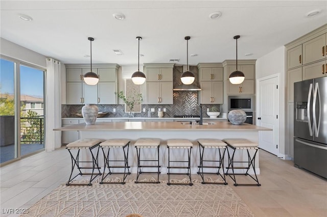 7983 Texas Hills St, Las Vegas, NV 89113 - kitchen with appliances with stainless steel finishes, wall chimney exhaust hood, decorative backsplash, and light countertops