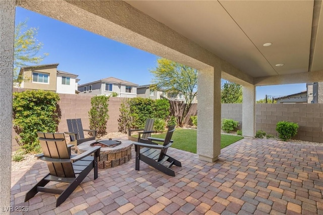 7983 Texas Hills St, Las Vegas, NV 89113 - view of patio with an outdoor fire pit
