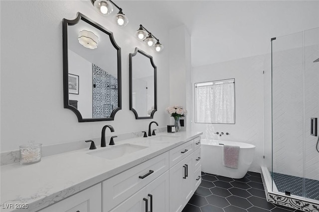 9428 Sierra Summit Ave, Las Vegas, NV 89134 - full bathroom with double vanity, a freestanding tub, a shower stall, and tile patterned floors