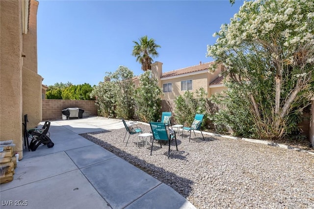 9428 Sierra Summit Ave, Las Vegas, NV 89134 - fenced backyard with a patio area