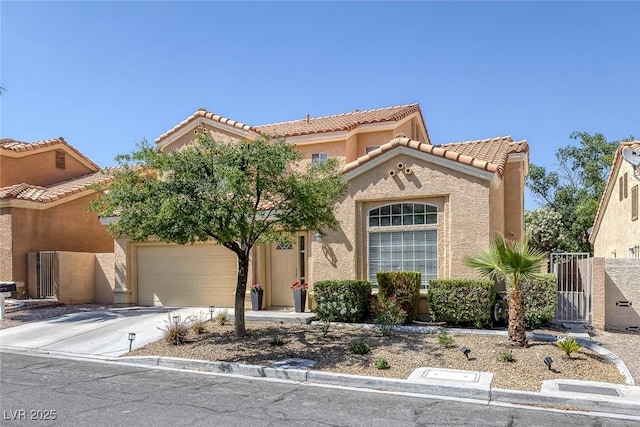 9428 Sierra Summit Ave, Las Vegas, NV 89134 - mediterranean / spanish-style house featuring a tiled roof, driveway, stucco siding, and a garage