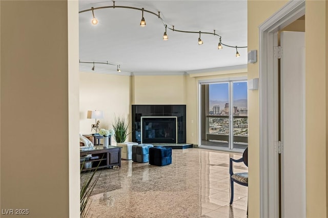 2777 Paradise Rd Unit 2302, Las Vegas, NV 89109 - living room featuring a tiled fireplace