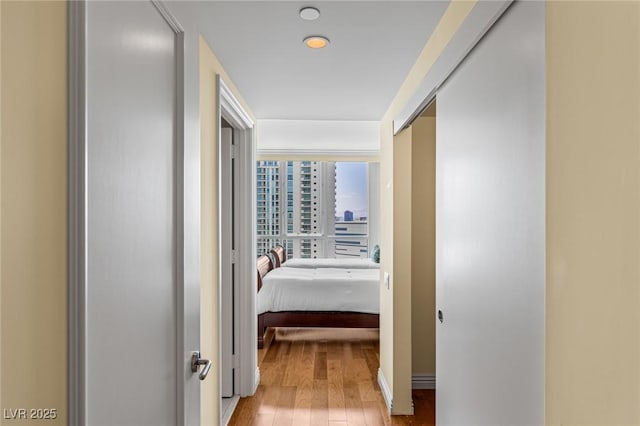 2777 Paradise Rd Unit 2302, Las Vegas, NV 89109 - corridor featuring wood finished floors and baseboards