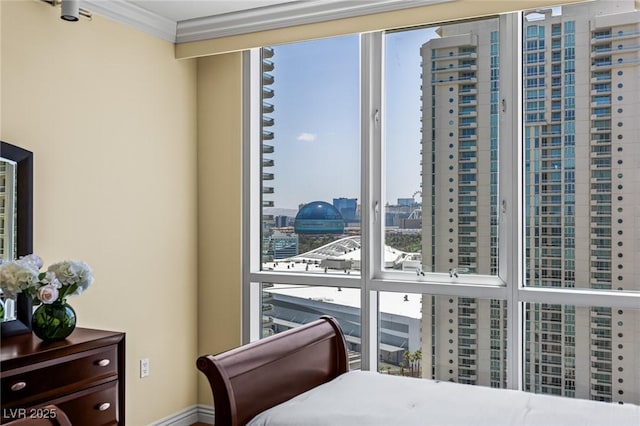 2777 Paradise Rd Unit 2302, Las Vegas, NV 89109 - bedroom with a city view and crown molding