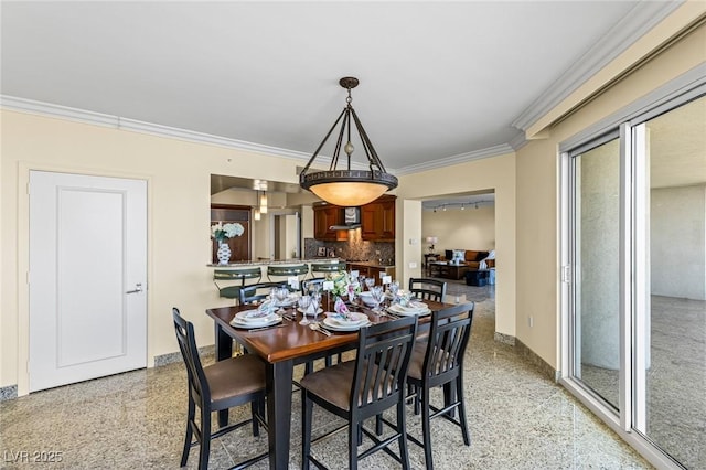 2777 Paradise Rd Unit 2302, Las Vegas, NV 89109 - dining room featuring ornamental molding