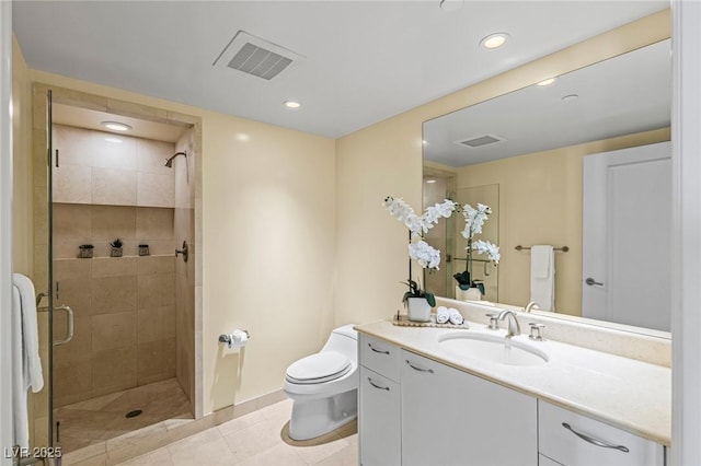 2777 Paradise Rd Unit 2302, Las Vegas, NV 89109 - bathroom featuring vanity, a stall shower, tile patterned flooring, and recessed lighting