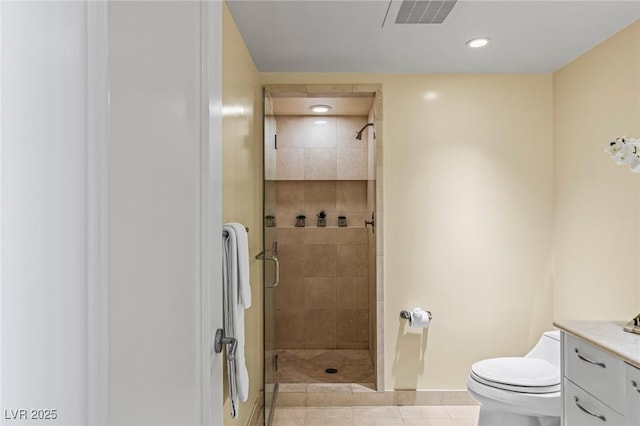 2777 Paradise Rd Unit 2302, Las Vegas, NV 89109 - bathroom featuring vanity, a stall shower, tile patterned flooring, and recessed lighting