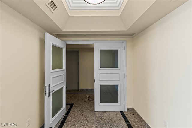 2777 Paradise Rd Unit 2302, Las Vegas, NV 89109 - corridor with a tray ceiling and inlaid floor details