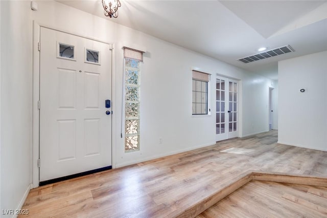 1953 Moyer Dr, Henderson, NV 89074 - foyer entrance featuring wood finished floors, french doors, recessed lighting, and baseboards