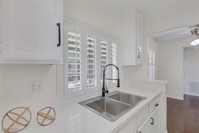 4843 S Torrey Pines Dr Unit 101, Las Vegas, NV 89103 - kitchen with a sink, white cabinets, light countertops, and ceiling fan