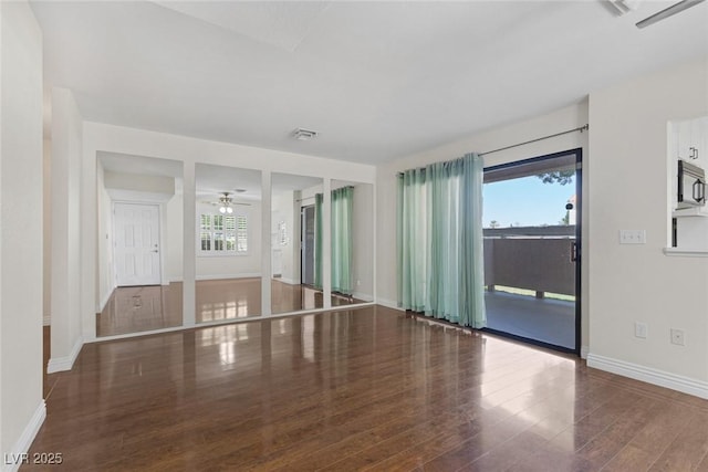 4843 S Torrey Pines Dr Unit 101, Las Vegas, NV 89103 - spare room with plenty of natural light, baseboards, wood finished floors, and ceiling fan