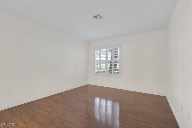 4843 S Torrey Pines Dr Unit 101, Las Vegas, NV 89103 - empty room with wood finished floors and baseboards