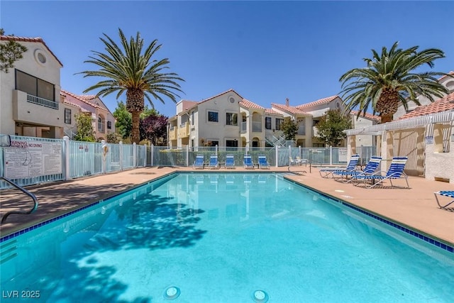 4843 S Torrey Pines Dr Unit 101, Las Vegas, NV 89103 - community pool with a patio and a residential view
