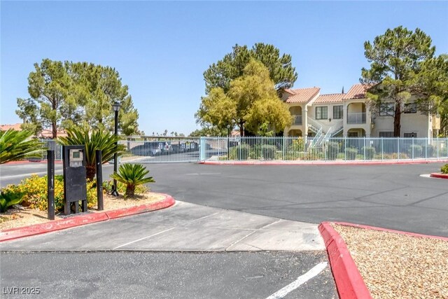4843 S Torrey Pines Dr Unit 101, Las Vegas, NV 89103 - view of asphalt street featuring curbs and street lighting