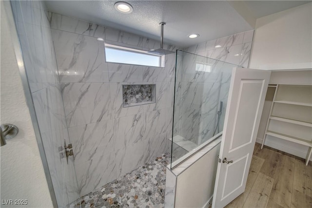 4861 Ridgewood, Pahrump, NV 89061 - full bathroom with a marble finish shower, wood finished floors, a walk in closet, and recessed lighting