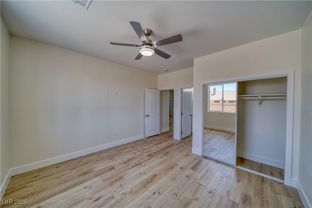4861 Ridgewood, Pahrump, NV 89061 - unfurnished bedroom featuring light wood-type flooring, baseboards, a closet, and ceiling fan