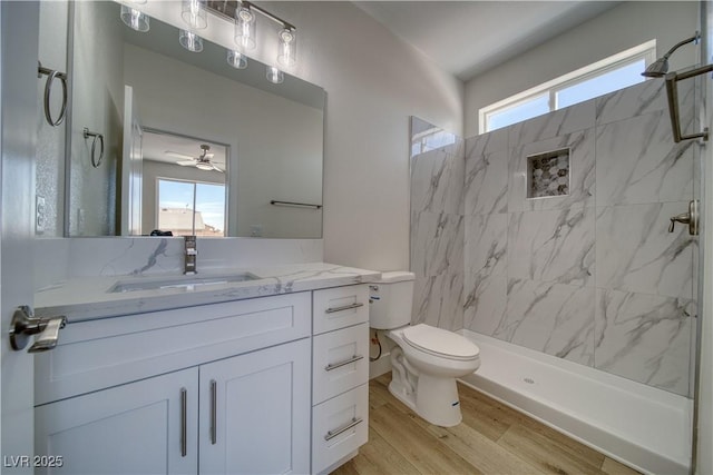4861 Ridgewood, Pahrump, NV 89061 - full bath featuring vanity, toilet, a marble finish shower, and wood finished floors