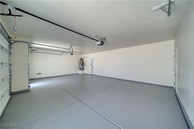4861 Ridgewood, Pahrump, NV 89061 - garage with a garage door opener and baseboards