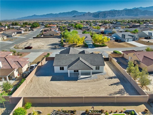4861 Ridgewood, Pahrump, NV 89061 - aerial perspective of suburban area featuring a mountainous background