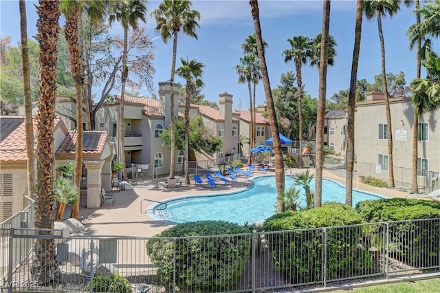 3145 E Flamingo Rd Unit 2080, Las Vegas, NV 89121 - community pool featuring a patio area and a residential view
