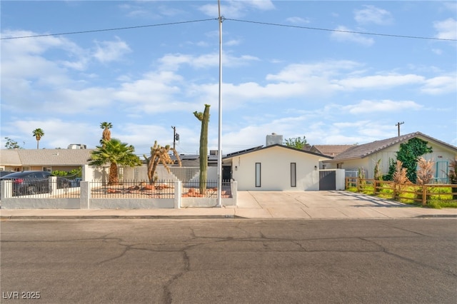 4301 Fortune Ave, Las Vegas, NV 89107 - ranch-style home with a fenced front yard, a gate, driveway, and stucco siding