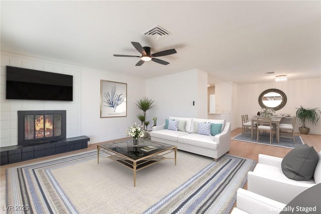 4301 Fortune Ave, Las Vegas, NV 89107 - living room with a ceiling fan and a tiled fireplace
