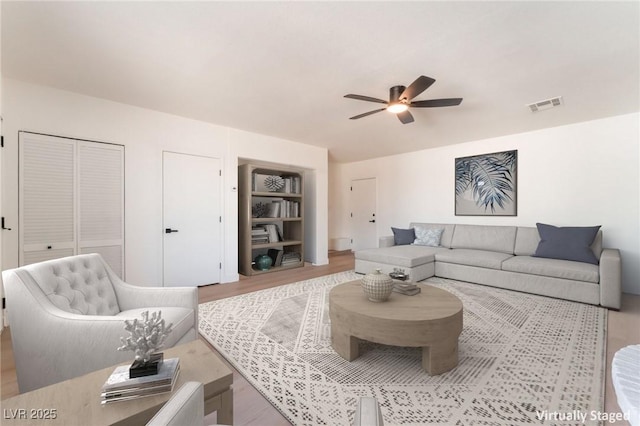 4301 Fortune Ave, Las Vegas, NV 89107 - living area featuring a ceiling fan and light wood finished floors