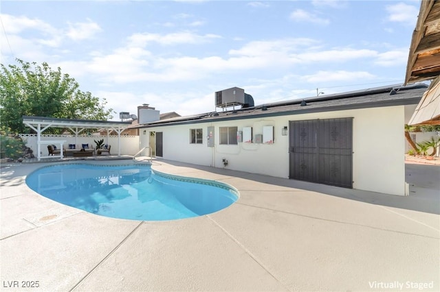 4301 Fortune Ave, Las Vegas, NV 89107 - view of swimming pool featuring a patio, a fenced backyard, and central AC unit