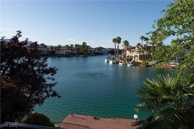 8740 Captains Pl, Las Vegas, NV 89117 - water view featuring a dock and nearby suburban area