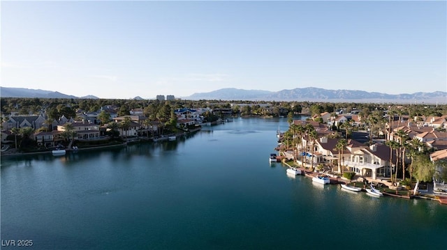8740 Captains Pl, Las Vegas, NV 89117 - water view with nearby suburban area and a mountainous background