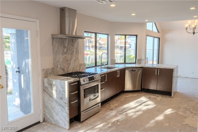 8740 Captains Pl, Las Vegas, NV 89117 - kitchen featuring appliances with stainless steel finishes, wall chimney exhaust hood, a sink, a chandelier, and light stone countertops