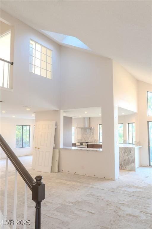 8740 Captains Pl, Las Vegas, NV 89117 - carpeted foyer entrance with a high ceiling