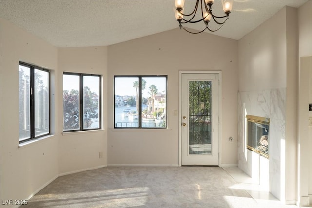 8740 Captains Pl, Las Vegas, NV 89117 - unfurnished sunroom with a chandelier and vaulted ceiling