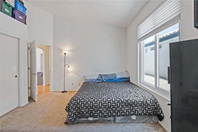 5317 Marietta Ave, Las Vegas, NV 89108 - carpeted bedroom featuring arched walkways