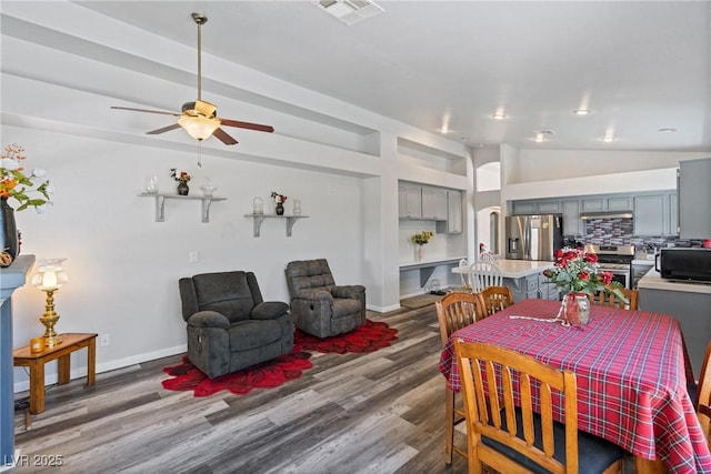 5317 Marietta Ave, Las Vegas, NV 89108 - dining room featuring lofted ceiling, dark wood-type flooring, a ceiling fan, baseboards, and recessed lighting