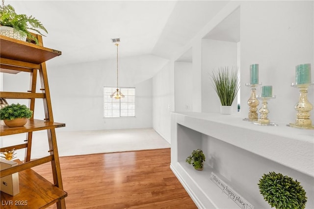5704 Owl Butte Ct, Las Vegas, NV 89149 - hall with wood finished floors and a chandelier