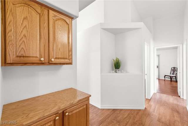 5704 Owl Butte Ct, Las Vegas, NV 89149 - hall featuring light wood-type flooring and baseboards